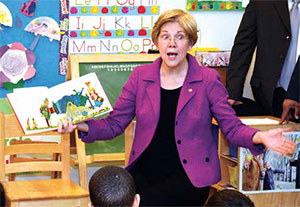 La Senadora Elizabeth Warren anima la lectura de un libro que leyó y luego regaló a los niños de Pre-Kinder. Senator Elizabeth Warren animates her reading while reading from a book to Pre-Kinder kids which she later donated.