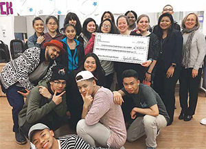 The Lowell CHC Developing Leaders Council members Beth Knudson, Shalmai Rivera and Sokhom Chun present a check for $4,378 in proceeds from their December Winter Mixer to the health center’s Teen BLOCK youth program in support of overnight retreats.